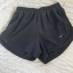 All black Nike shorts, size small